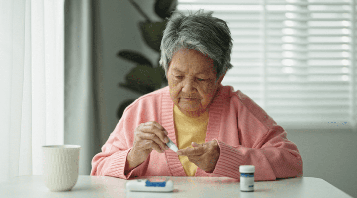 Person checking their blood sugar.