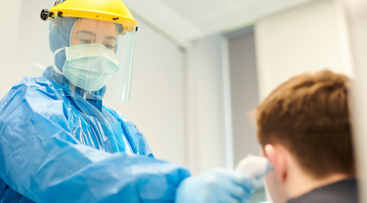 Dentist in PPE Gear