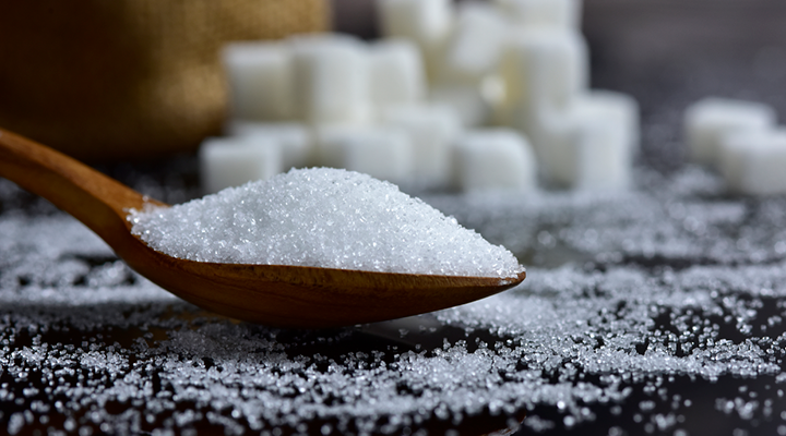 Sugar on a spoon, ready to be served.
